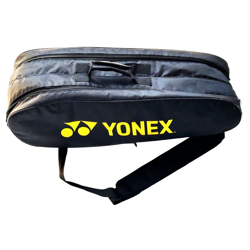 Sports Galaxy - Online Sports Store in India - Sports Galaxy - Online Sports Store in India Used Yonex Black and Yellow Kitbag – 2 Compartments with Front Zip Pocket | 6-Racket Holder